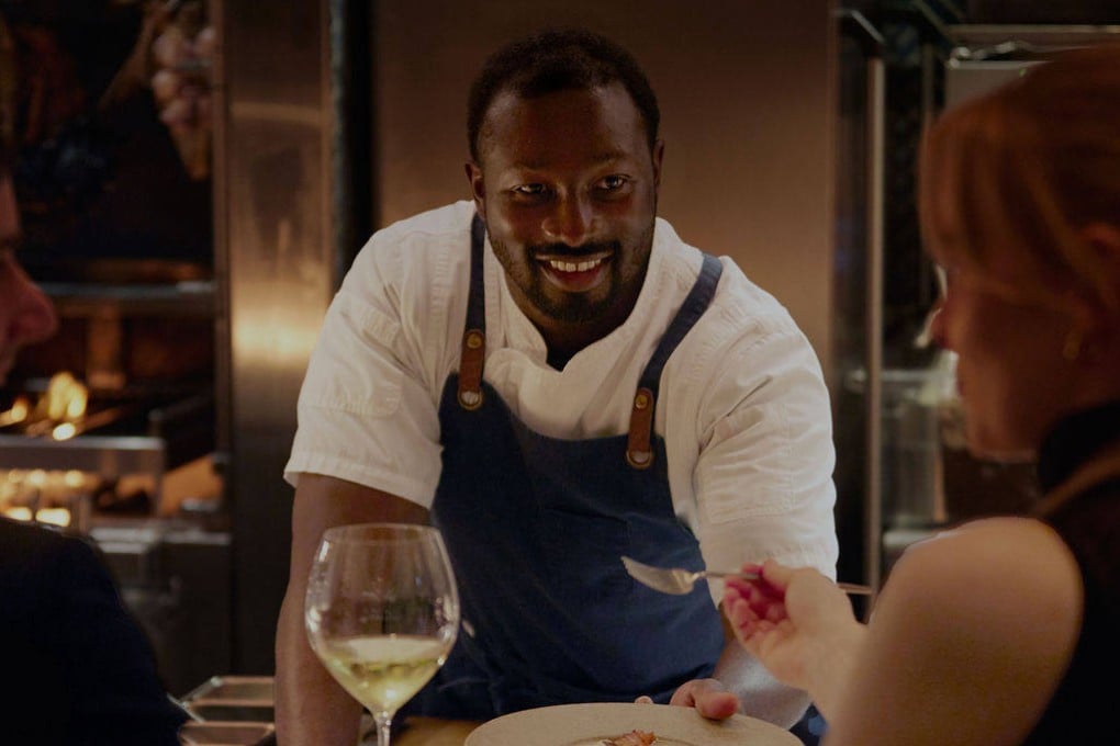 Chef Brian Cole serves diners at Hearth, the signature fine dining restaurant at Perth’s Ritz-Carlton, in Western Australia. Photo: The Ritz-Carlton, Perth - Hearth Restaurant
