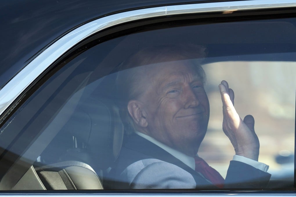 US President Donald Trump waves to the press as he leaves a luncheon in Washington, on March 12. Photo: AP