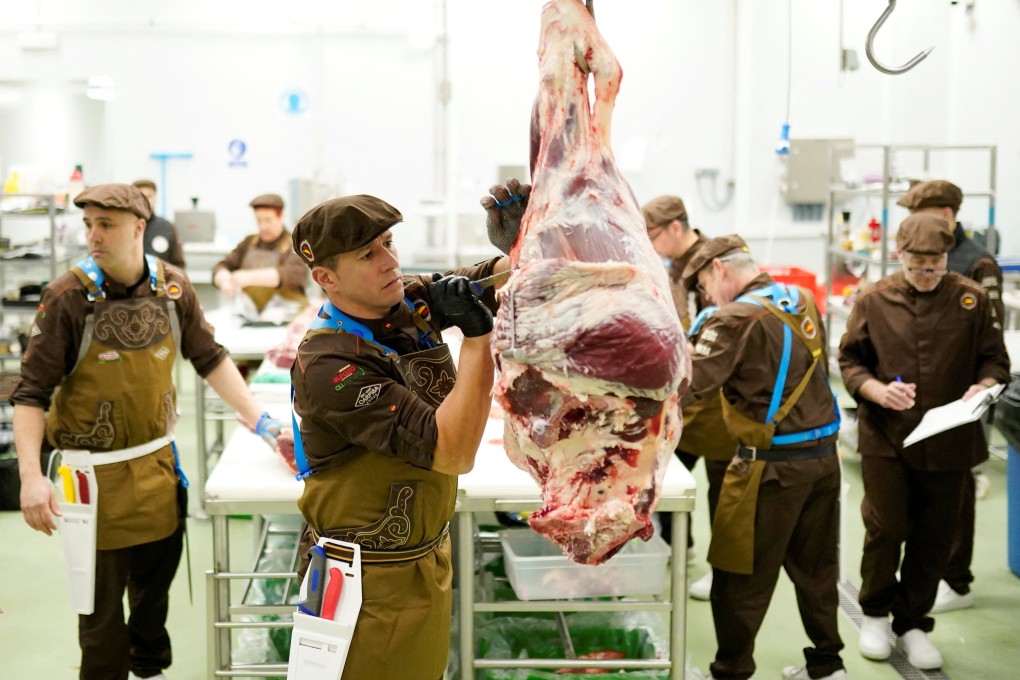 A Spanish butcher prepares a side of beef in Madrid during a rehearsal for the World Butchers’ Challenge. The “World Cup of butchery” takes place in France on March 31. Photo: Reuters