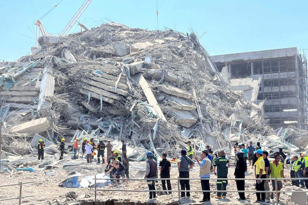 Rescuers work at the site of a collapsed building after the tremors of a strong earthquake that struck central Myanmar on Friday affected Bangkok. Photo: Reuters