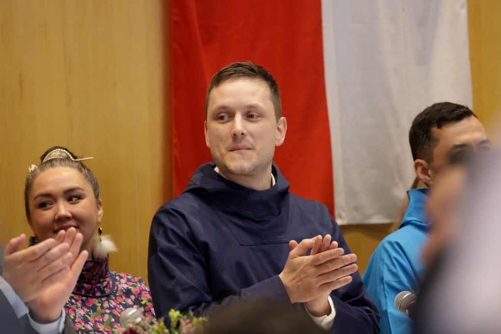 Leader of the Democrats (Demokraatit) party and Greenland’s Prime Minister-elect Jens-Frederik Nielsen at a ceremony to sign a coalition agreement, in Nuuk on Friday. Photo: Reuters