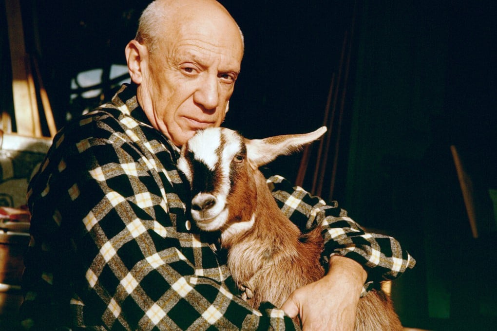Pablo Picasso with his goat, Esmeralda. Photo: Edward Quinn