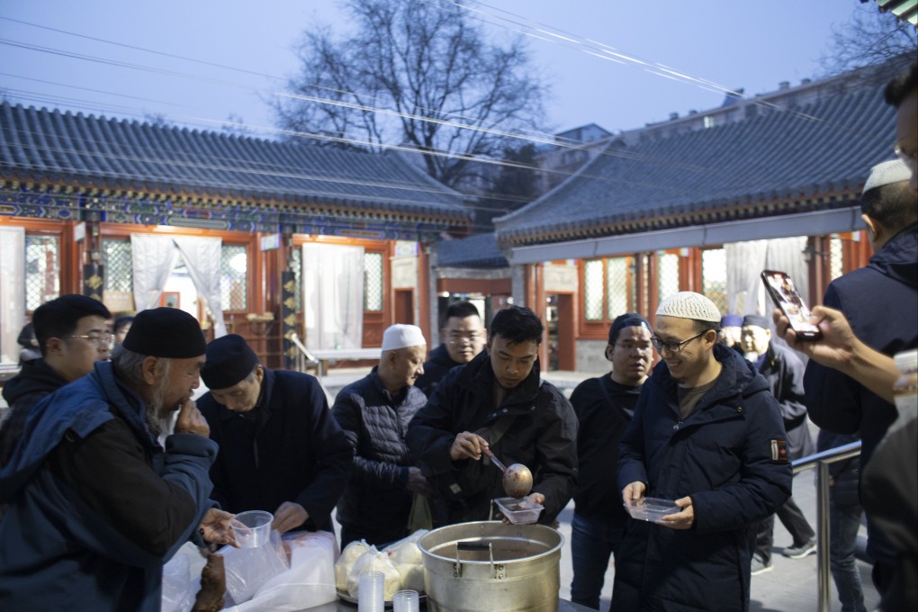 Muslims break their fast on the first day of the holy month of Ramadan at Niujie Mosque in Beijing on March 1. Photo: EPA-EFE