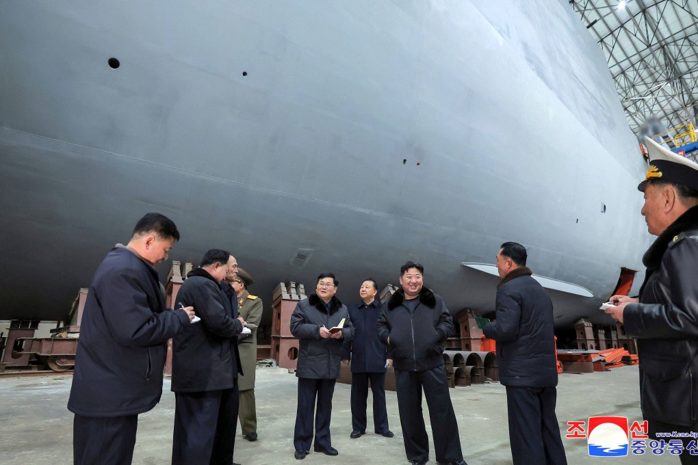 North Korean leader Kim Jong-un inspects a shipbuilding project at a shipyard at an undisclosed location in North Korea. Photo: AFP