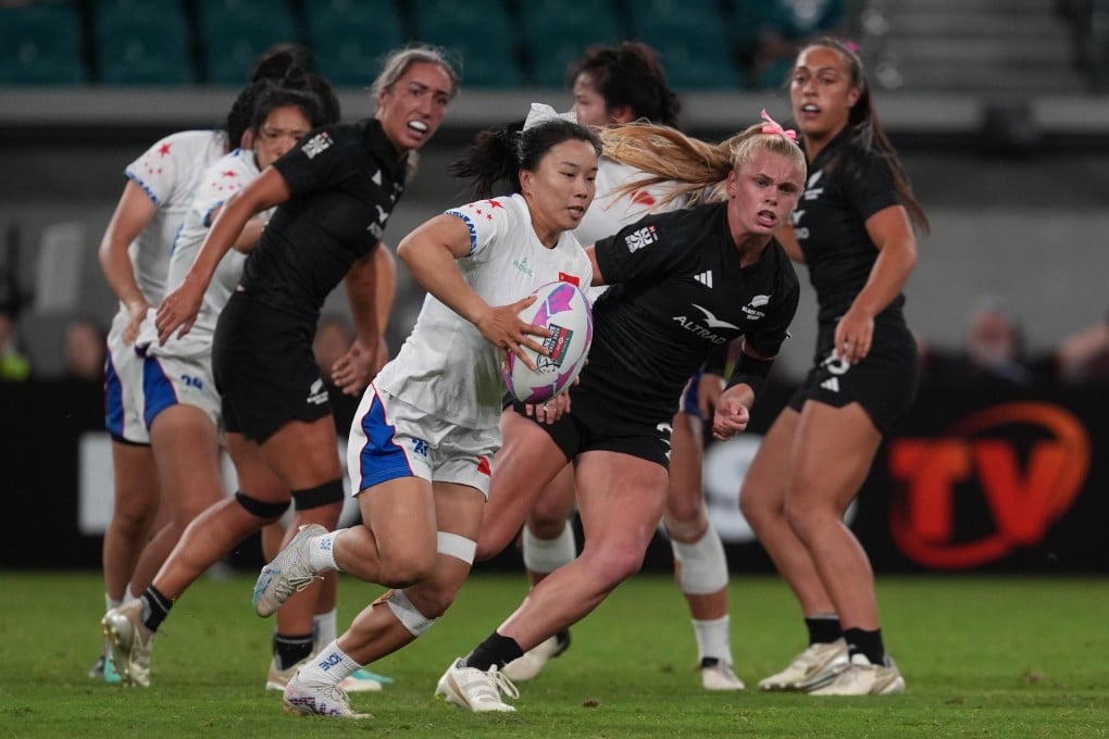 China (in white) put in a strong performance in the first half against New Zealand. Photo: Elson Li