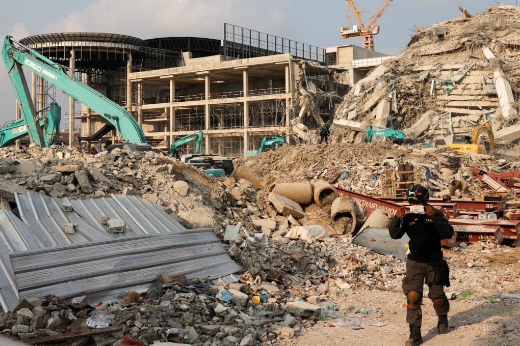 Rescue workers at the site of a building that collapsed in Bangkok, following Friday’s strong earthquake, on Saturday. Photo: Reuters