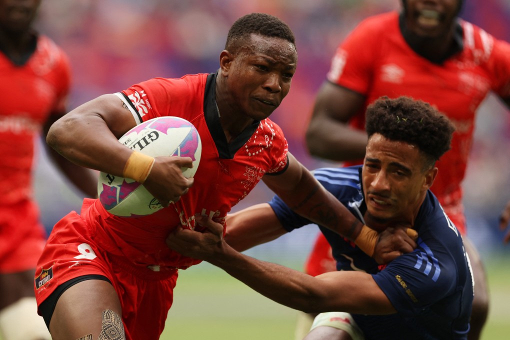 Kenya’s Samuel Asati is tackled by France’s Enahemo Artaud in their pool match, which the French won 14-7. Photo: Reuters