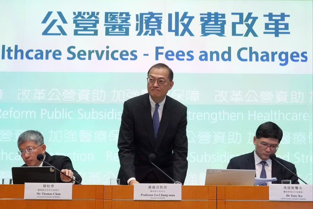 Hong Kong Secretary for Health Lo Chung-mau (centre) speaks about the changes to public hospital fees and charges, at the government headquarters in Tamar, on March 25. Photo: May Tse