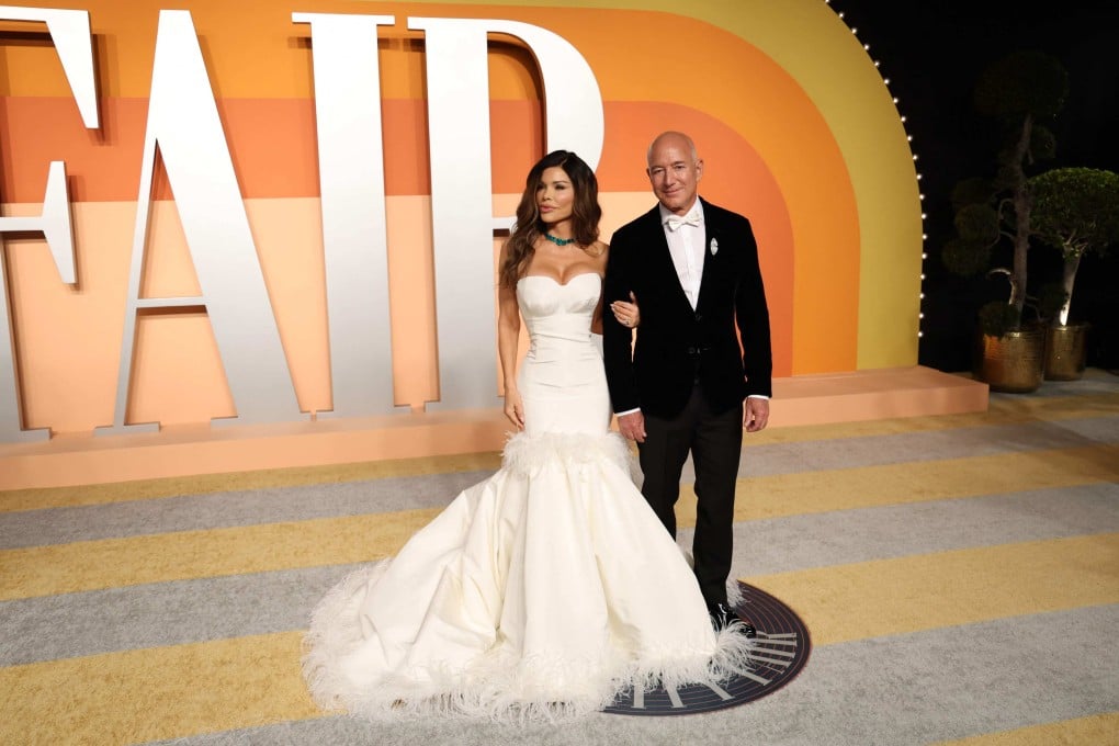 Amazon boss Jeff Bezos and his fiancée Lauren Sanchez attend the Vanity Fair Oscar party in Beverly Hills, California, on March 2. Photo: AFP