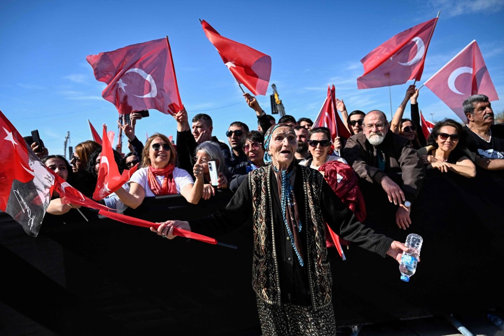 Protestors wave Turkish flags during a rally called by the Republican People’s Party (CHP) in support of Istanbul’s arrested mayor Ekrem Imanoglu, in Maltepe on the outskirts of Istanbul, on Saturday. Photo: AFP