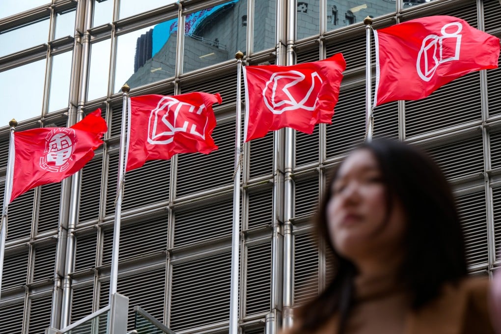 CK Hutchison’s flags on display at Cheung Kong Center in Central. Photo: Sam Tsang