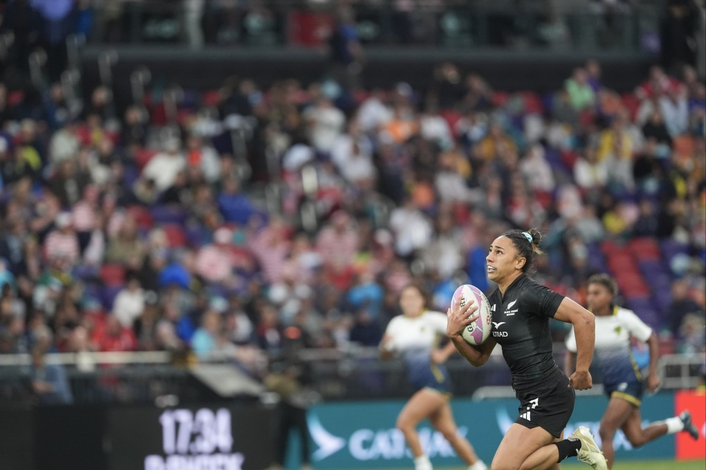 New Zealand’s Risi Pouri-Lane outpaces her Brazilian opponents on day two of the Hong Kong Sevens. Photo: Elson Li