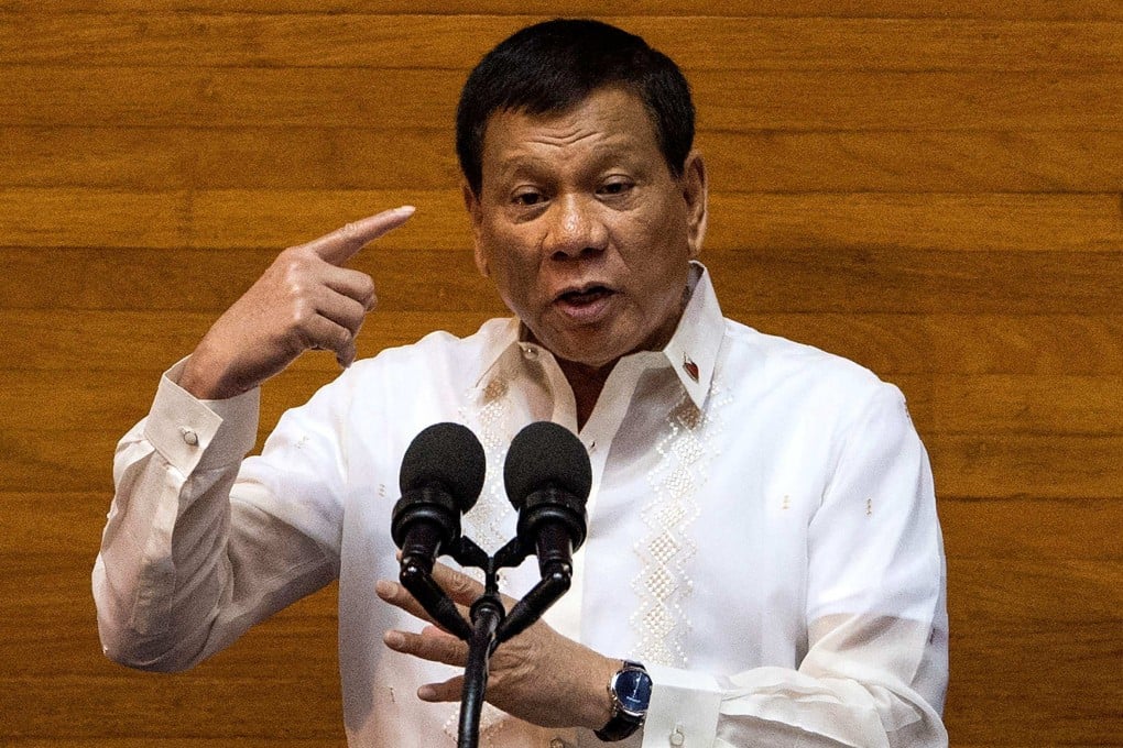 Philippine President Rodrigo Duterte gesturing as he delivers his state of the nation address at Congress in Manila. Photo: AFP