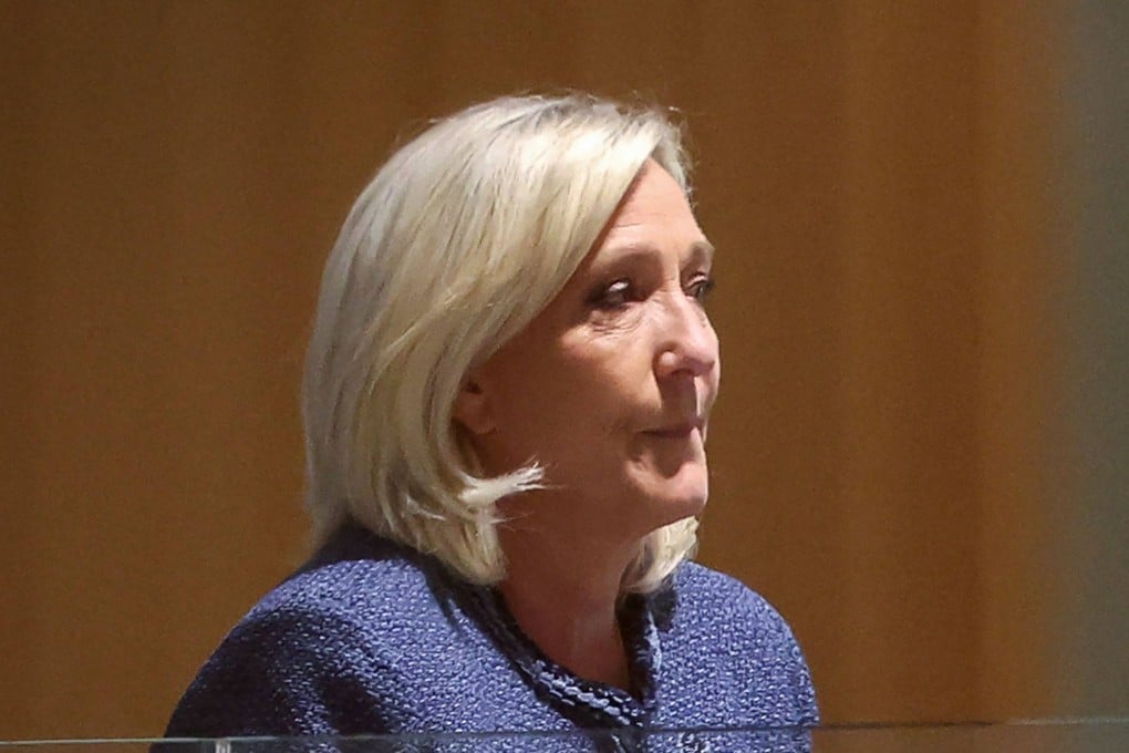 President of the parliamentary group of the French far-right Rassemblement National party, Marine Le Pen arrives at the Paris courthouse for her trial verdict on suspicion of embezzlement of European public funds, in Paris, on March 31. Photo: AFP
