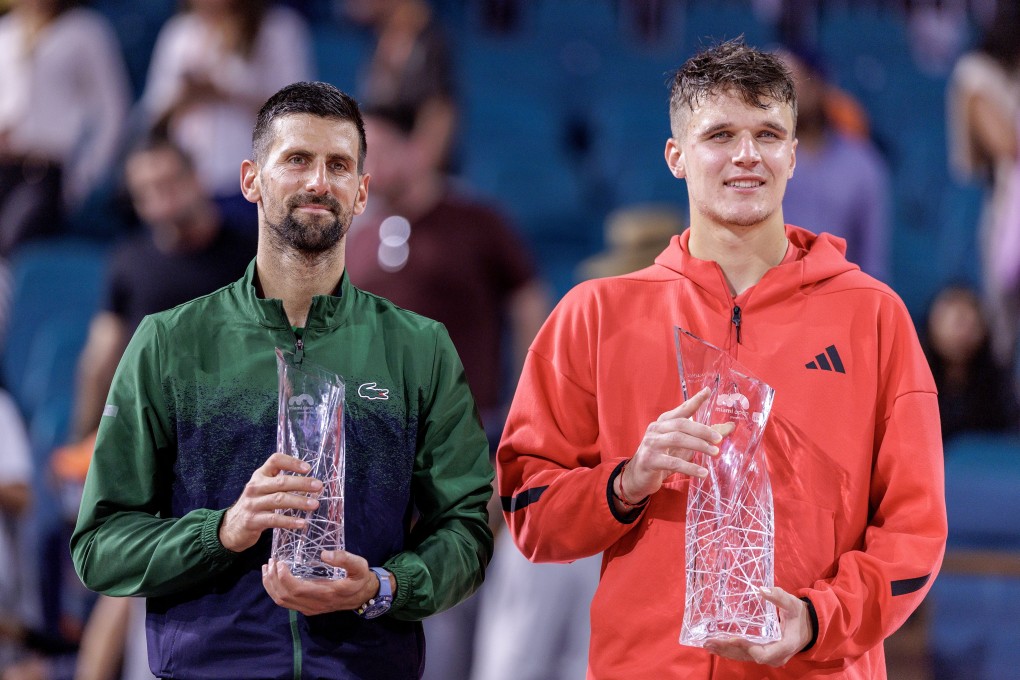 Jakub Mensik (right) poses with the Miami Open trophy alongside his idol and runner-up, Novak Djokovic. Photo: EPA