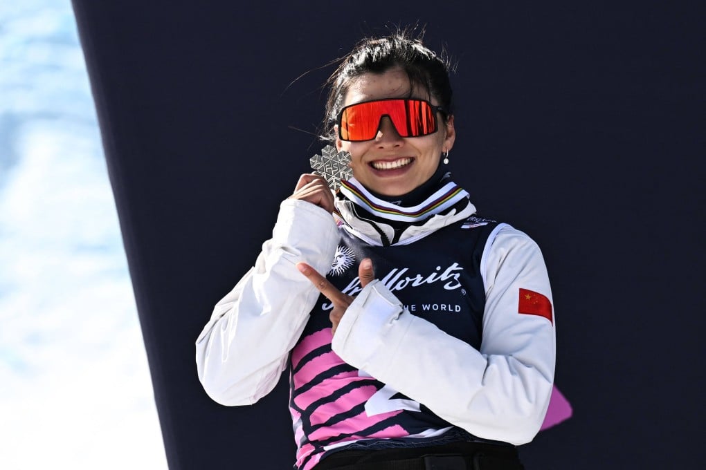 Silver medallist Xu Mengtao poses during the aerials podium ceremony on Sunday. Photo: AFP