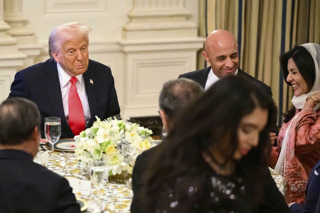 US President Donald Trump, left, seated with Saudi Arabia’s ambassador to the US Princess Reema bint Bandar Al Saud, right, at the White House in Washington on Thursday. Photo: Pool via AP