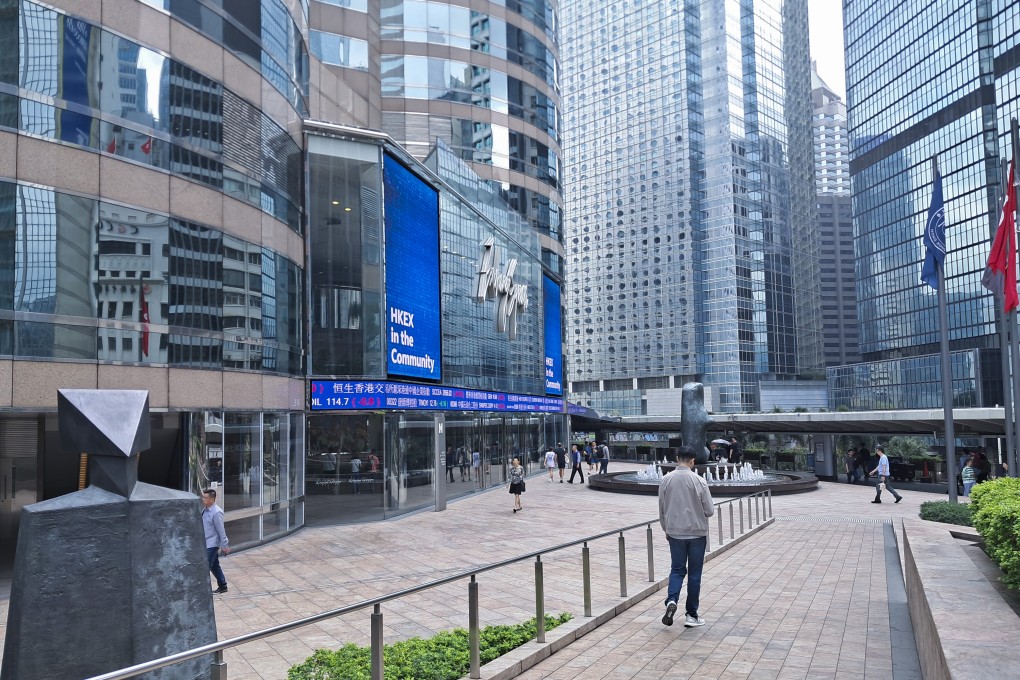 People walk past Exchange Square in Central, home of bourse operator Hong Kong Exchanges and Clearing, on March 28, 2025. Photo: Matthew Miller