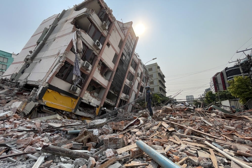 A rescuer from China searches for survivors in Mandalay, Myanmar, on Monday after Friday’s earthquake. Photo: Xinhua