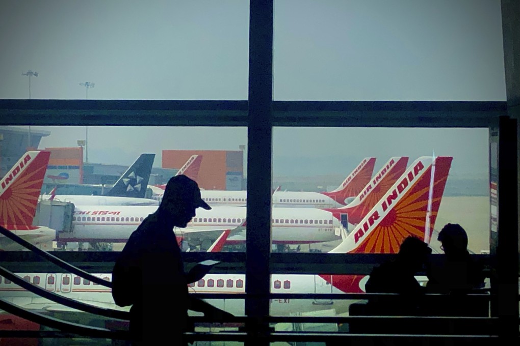 Air India aircraft parked in the background in New Delhi. Photo: AP