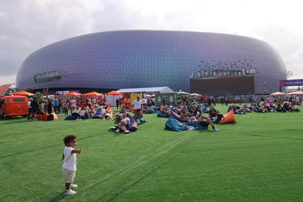Rugby fans relax outside the Kai Tak stadium on March 28, the first of the Hong Kong Sevens. The new stadium has proved itself a very good facility to support Hong Kong’s ambitions for events. Photo: Handout
