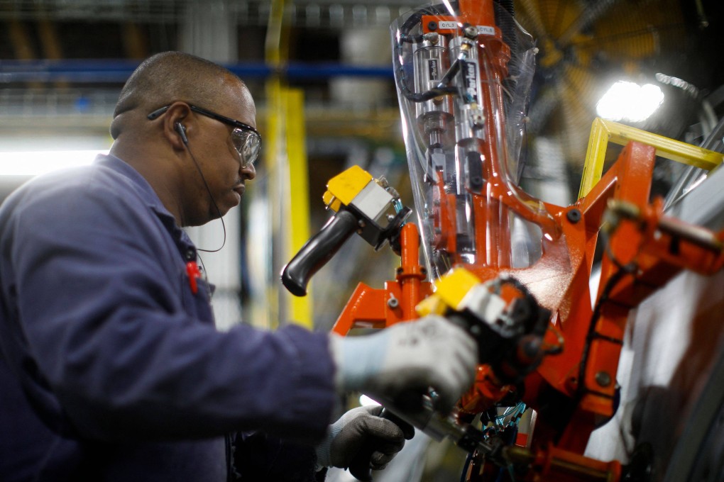 Assembly worker at the newly renovated Ford’s Assembly Plant in Chicago on June 24, 2019. Photo: AFP.