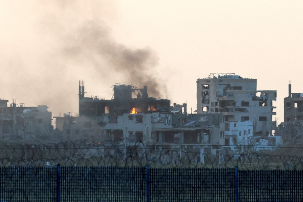 Smoke rises from buildings in Gaza after an air strike. Photo: Reuters