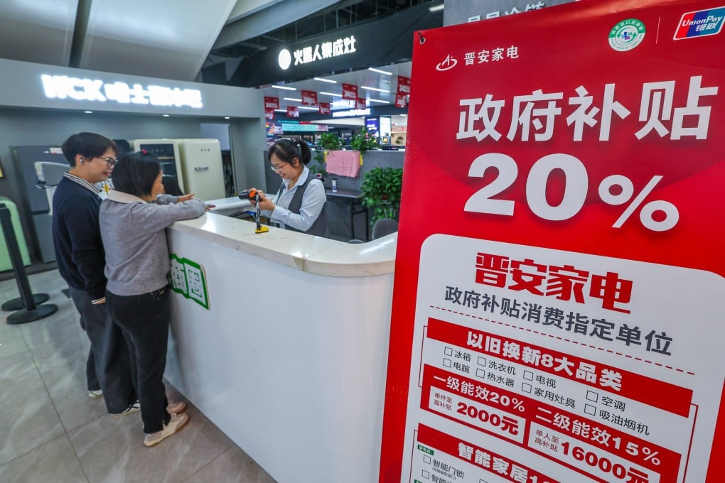 Customers apply for subsidies under a government trade-in programme for consumer goods in the eastern Chinese city of Hangzhou. Photo: Xinhua