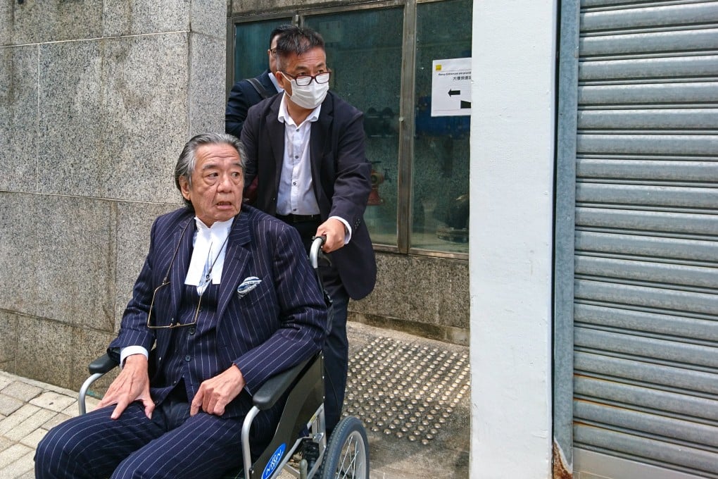 Transport worker Wong Chi-wing (right) leaves court with his lawyer Lawrence Lok (in wheelchair) after a hearing last week. Photo: Brian Wong