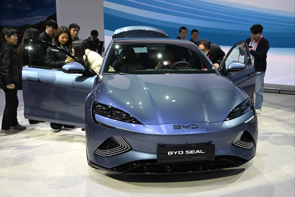 Visitors look at the BYD Seal electric car during a preview of the Seoul Mobility Show 2025 on April 3, 2025. Photo: AFP