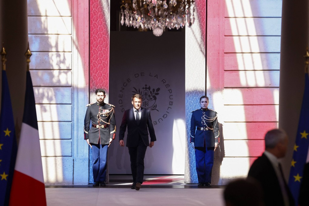 France’s President Emmanuel Macron arrives for a meeting with representatives of the sectors affected by US tariffs, at the Elysee Palace in Paris on Thursday. Photo: AFP