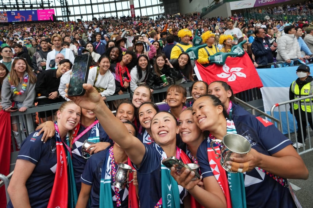 The Hong Kong women’s team takes a selfie with fans after beating Kazakhstan on Day 3 of the Hong Kong Sevens at Kai Tak Stadium on March 30. Photo: Sam Tsang