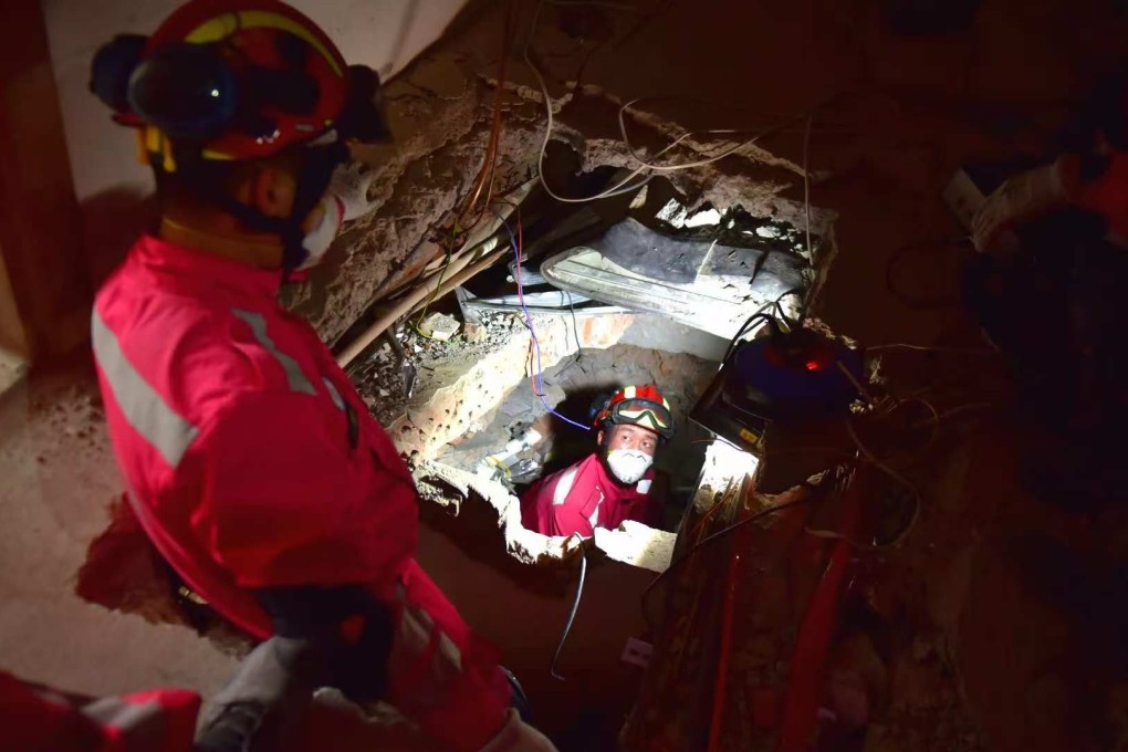 Members of the China international search and rescue team carry out a search and rescue operation at a hotel in Mandalay, Myanmar, on Tuesday. Photo: handout via Xinhua