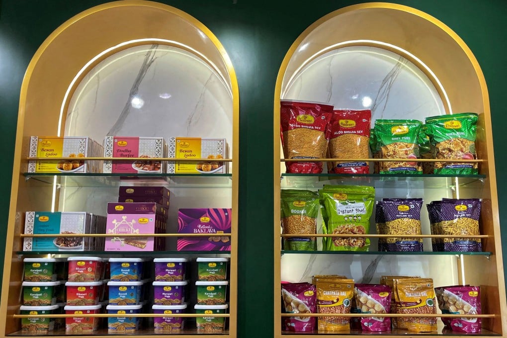 Packets of snacks on the shelves inside a Haldiram’s restaurant in Mumbai, India. Photo: Reuters