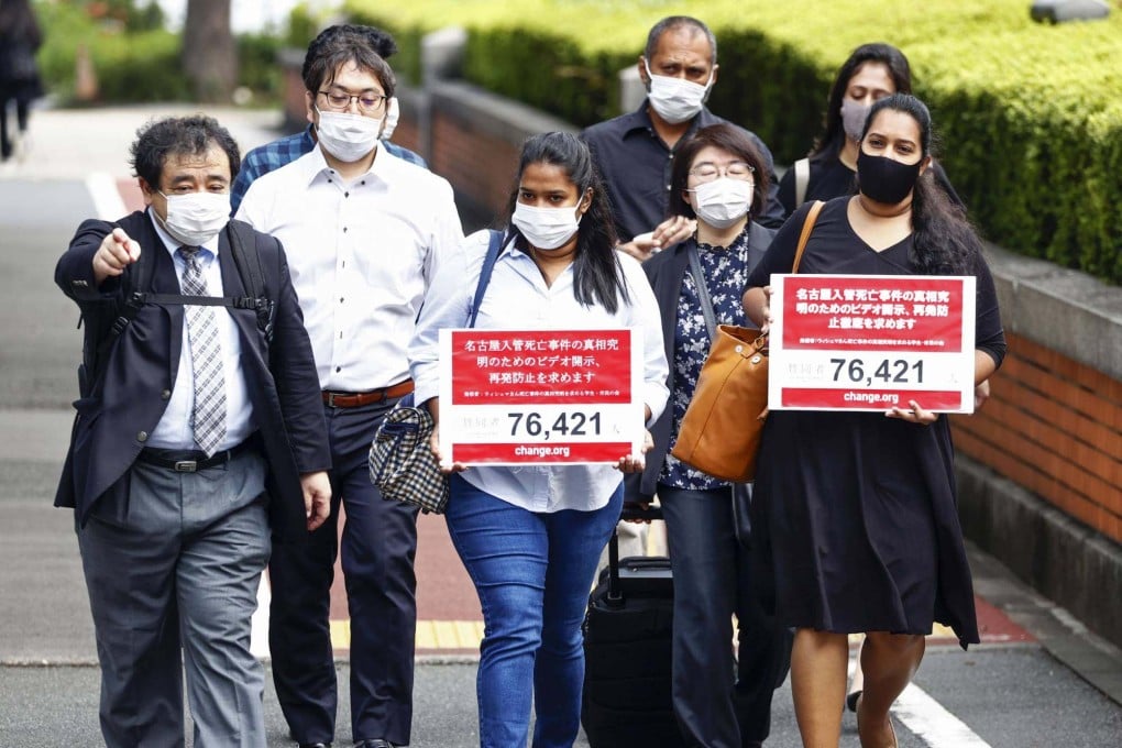 The sisters of the late Wishma Sandamali, a Sri Lankan detainee who died in Nagoya in 2021, on a visit to the Immigration Services Agency in Tokyo in 2021. Photo: Kyodo