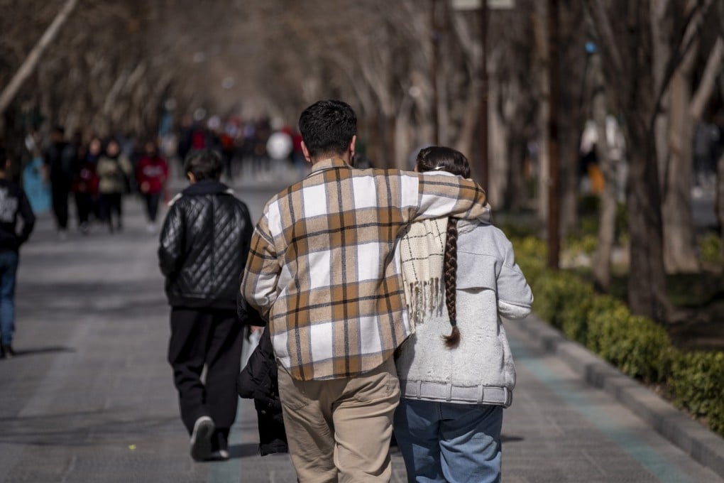 A young Iranian couple in the historic city of Isfahan in Iran, where young people who want to date are caught between tradition and modernity. Photo: NurPhoto via Getty Images