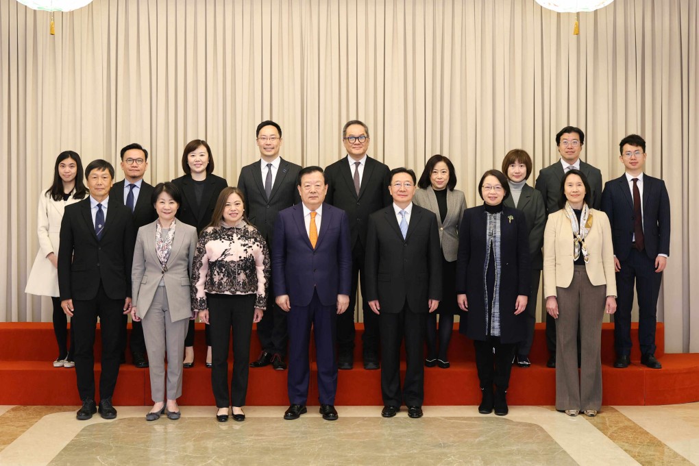 Hong Kong tourism chief Rosanna Law (front row, third left) met Xia Baolong (front row, centre) in Beijing. Photo: Handout