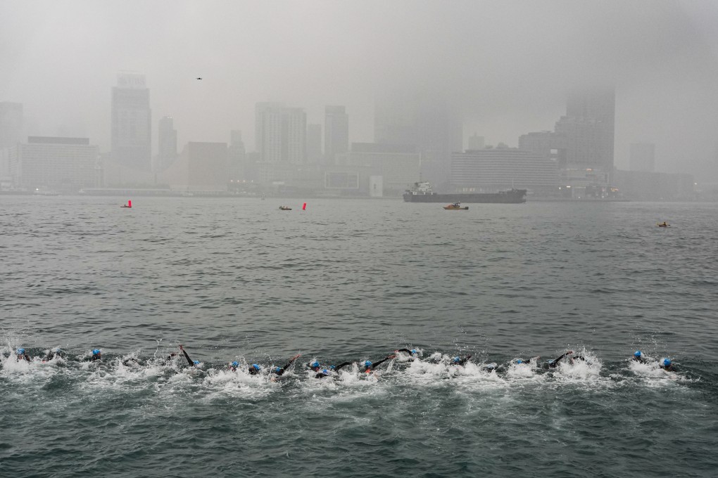 The elite women athletes enter the water on a gloomy start to the Asia Triathlon Sprint Championships in Hong Kong. Photo: Eugene Lee