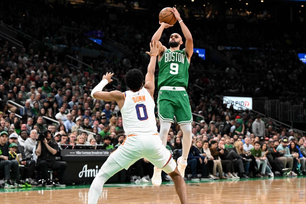 Boston’s Derrick White attempts a jump shot against Ryan Dunn of the Phoenix Suns during the second quarter at the TD Garden. Photo: Getty Images