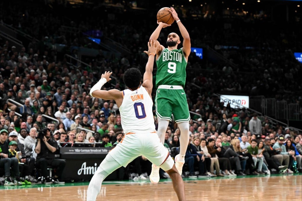 Boston’s Derrick White attempts a jump shot against Ryan Dunn of the Phoenix Suns during the second quarter at the TD Garden. Photo: Getty Images