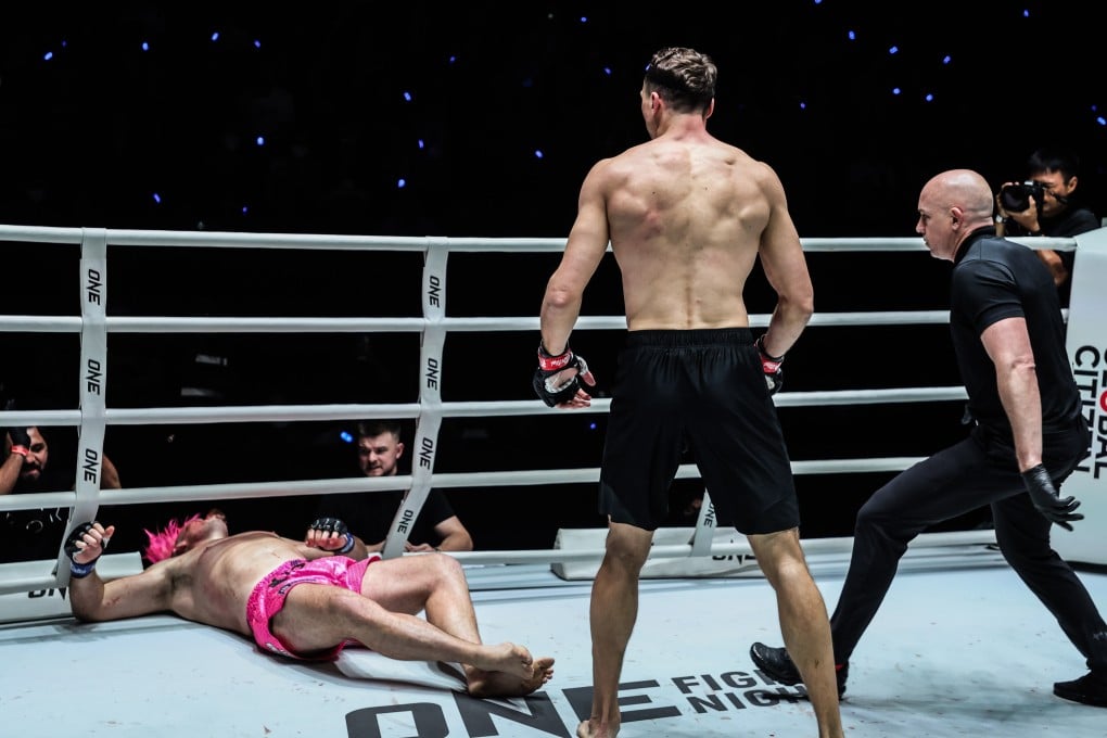 Roman Kryklia stands over a prone Lyndon Knowles after bringing their heavyweight Muay Thai title bout to an early conclusion at ONE Fight Night 30. Photo: ONE Championship