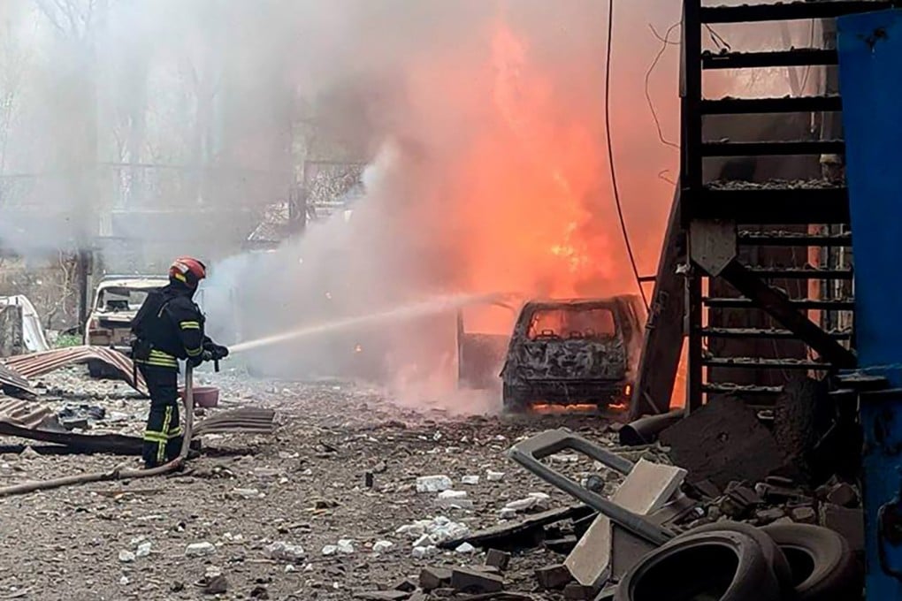 Ukrainian rescuers work to extinguish a fire at the site of a missile attack on April 2. Photo: Ukrainian Emergency Service/AFP