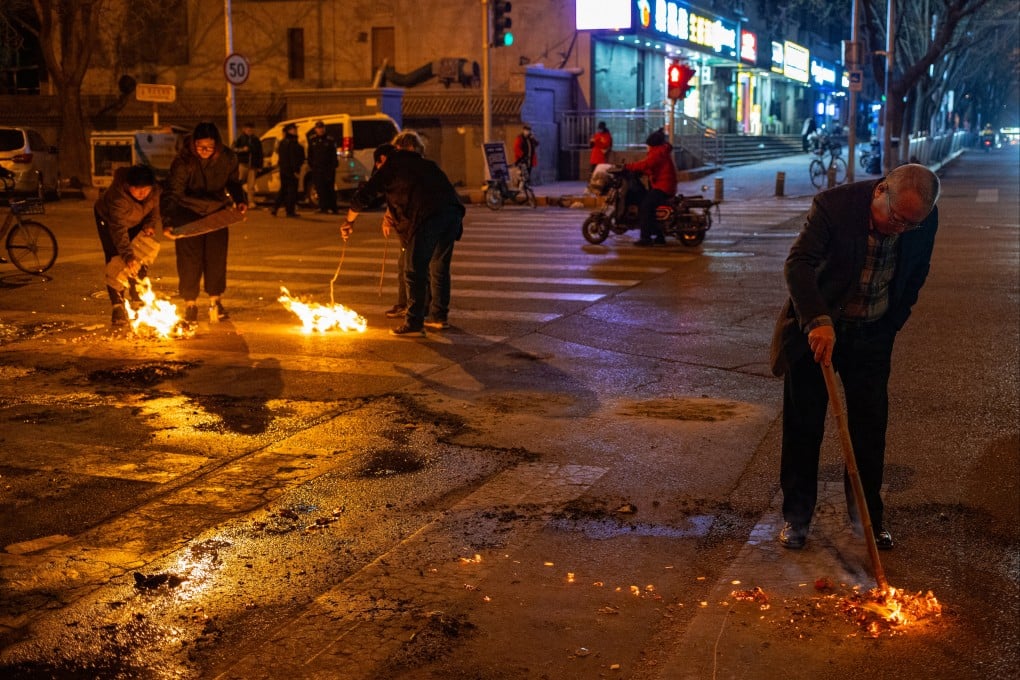 Authorities have warned of the fire risk from burning paper money and other offerings. Photo: EPA-EFE