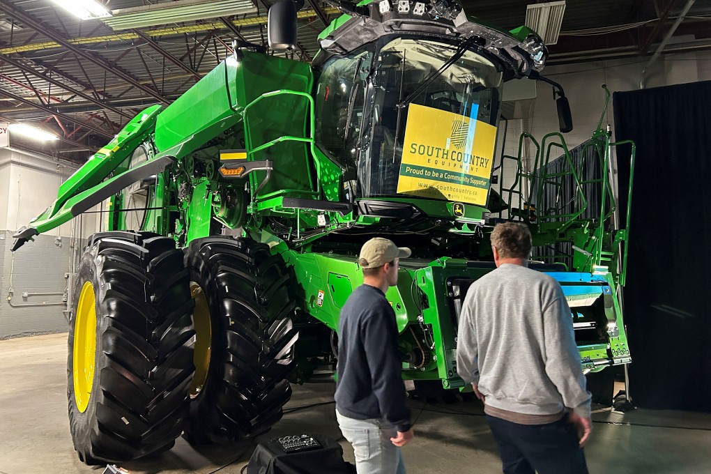 Farmers look at new machinery at a farm show in Regina, Saskatchewan, Canada, on March 19. Photo: Reuters