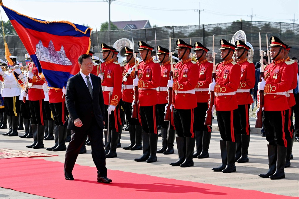 Cambodia’s Prime Minister Hun Manet walks past an honour guard during the inauguration ceremony of the modernised infrastructure at the Ream Naval Base in Preah Sihanouk province on Saturday. Photo: AFP