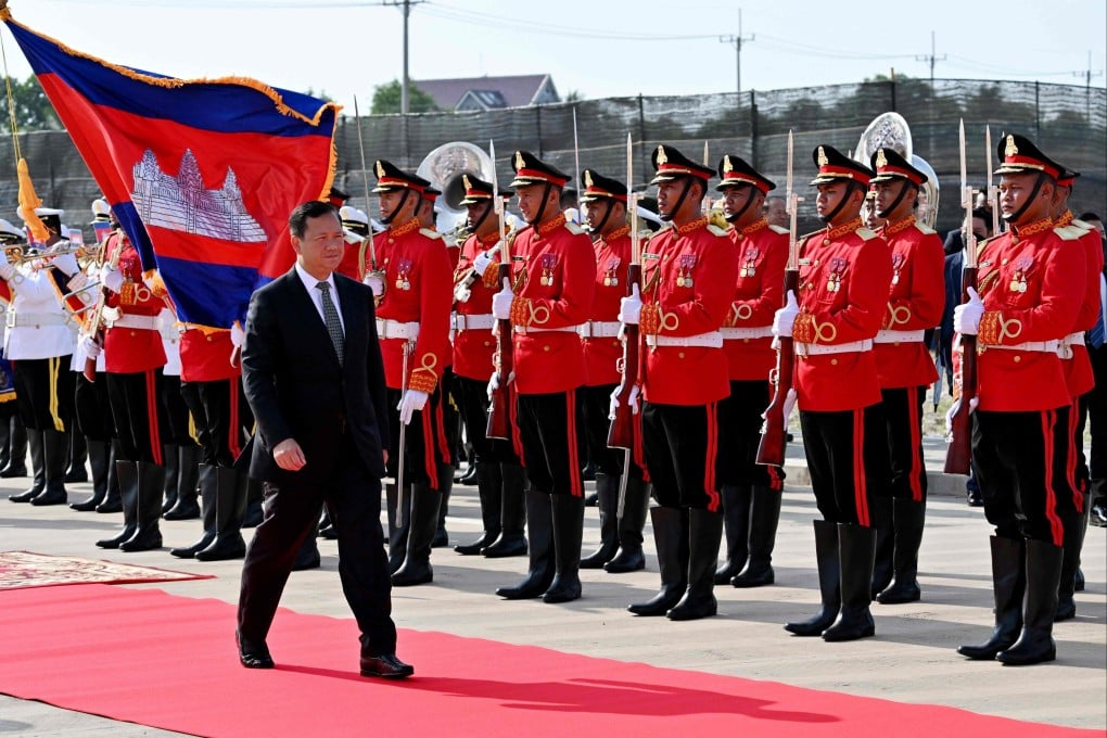 Cambodia’s Prime Minister Hun Manet walks past an honour guard during the inauguration ceremony of the modernised infrastructure at the Ream Naval Base in Preah Sihanouk province on Saturday. Photo: AFP