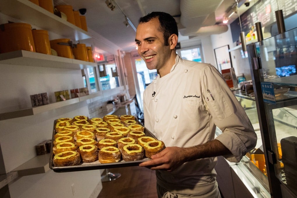 Dominique Ansel with Cronuts, croissant-doughnut hybrids, at Dominique Ansel Bakery in New York. Chefs in the city are turning out croissant crossover that get ever more wild. Photo: Getty Images