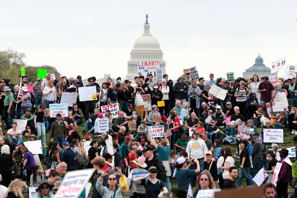 Protesters attend a “Hands Off” rally to demonstrate against US President Donald Trump on the National Mall in Washington on Saturday. Photo: AFP