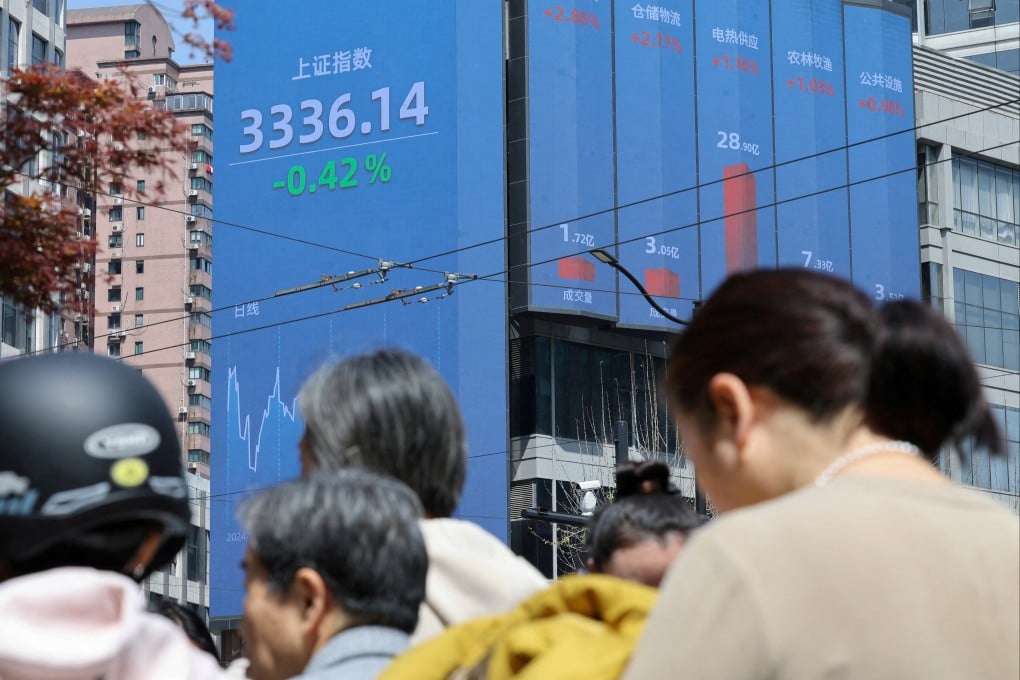 Electronic boards show Shanghai stock data and other market indices on April 3, 2025. Photo: Reuters