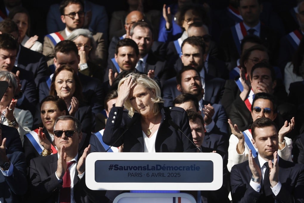 Far-right Rassemblement National (RN) leader Marine Le Pen delivers a speech during a rally in her support one week after being convicted, in Paris, France on Sunday. Photo: EPA-EFE